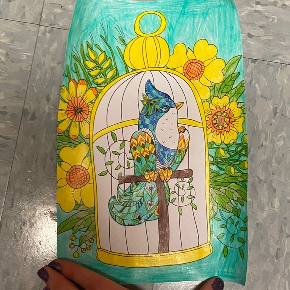 Picture of a Bird in a Birdcage with Yellow Flowers - Picture 1 of 3